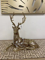 Reindeer gold sitting